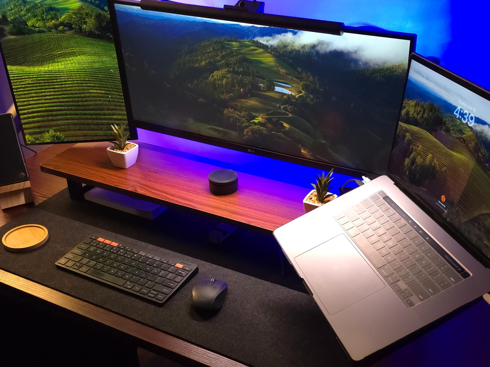 Image of my workspace peripherals: mouse, keyboard, light, etc.